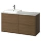The ÄNGSJÖN bathroom vanity a wooden cabinet with four drawers and a white countertop. It includes a square sink with a modern, minimalist design.