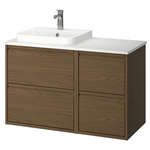 Modern wooden vanity in warm brown with white marble top & sink.