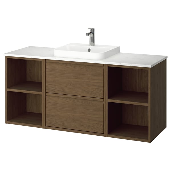 The ÄNGSJÖN bathroom cabinet in brown oak. It a semi-recessed white marble sink atop open and closed storage.