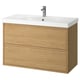 Modern oak bathroom vanity, wall-mounted with smooth white basin, minimalist design, chrome tap.