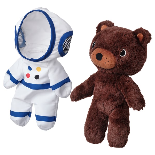 Two plush toys: white astronaut bear, brown teddy bear. Soft, huggable, space-themed.