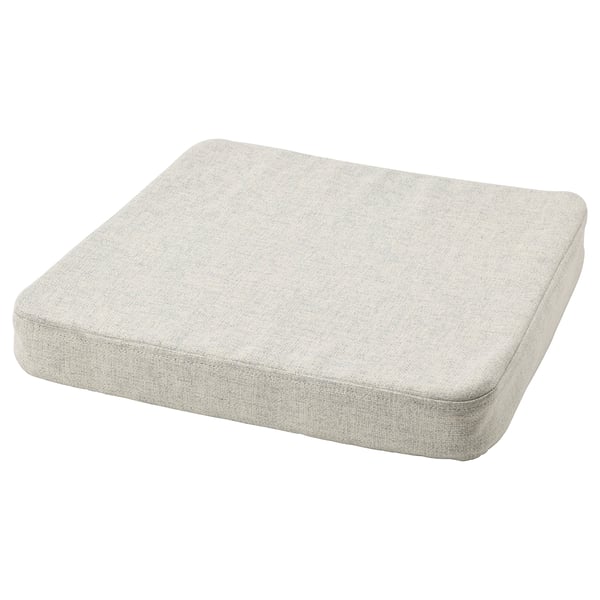 Beige, rectangular chair pad with memory foam and non-slip backing.