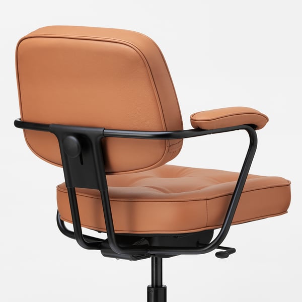 Brown leather office chair with black metal arms and base, high-quality materials, ergonomic design.