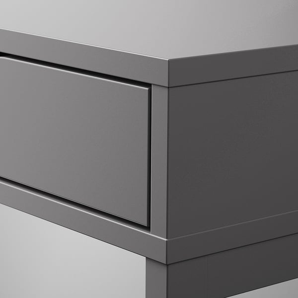 Modern, sleek desk with curated edges and built-in drawers, showcasing high-quality design and finish.