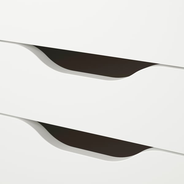 Modern white drawers with sleek black accents. Secure, functional, stylish.