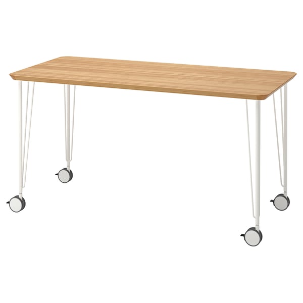 Anfalle light wooden desk with white legs and wheels.