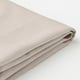 Folded beige fabric; smooth, textured; likely high-quality, washable.