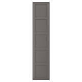 A grey, rectangular BERGSBO door with a modern, four-panel design. It is made of fibreboard with a semi-matte finish.