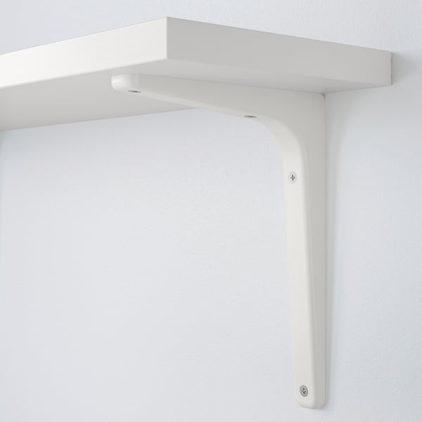 White wall-mounted shelf with sturdy metal bracket, securely attached to wall.