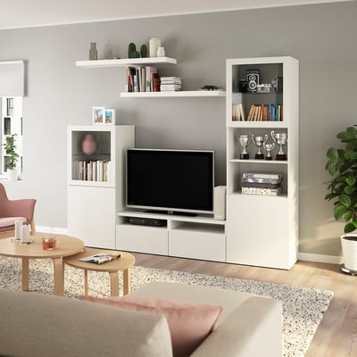 Modern living room with BESTÅ storage, tv, books & plants