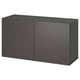 Black BESTÅ cabinet, rectangular shape with two doors, modern minimalist design.
