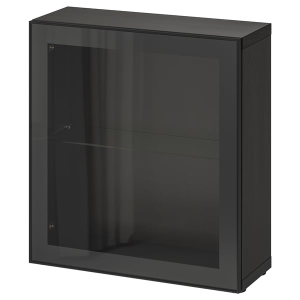 A sleek black BESTÅ storage unit featuring a glass door with a metal frame and tempered glass shelves for modern organising.