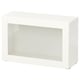 White BESTÅ storage unit. Rectangle shape with glass door, modern minimalist design.