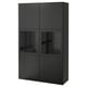 Black BESTÅ cabinet with glass doors for storage and display. Four sections. Sleek design.