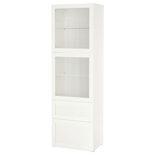 A white BESTÅ cabinet with glass doors and drawers. It has a tall, narrow shape with clean lines, offering both storage and display.