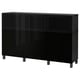 Black BESTÅ sideboard with glass doors, rectangular design.