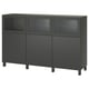 Black BESTÅ storage unit: sleek design with glass doors, adjustable shelves, metal legs.