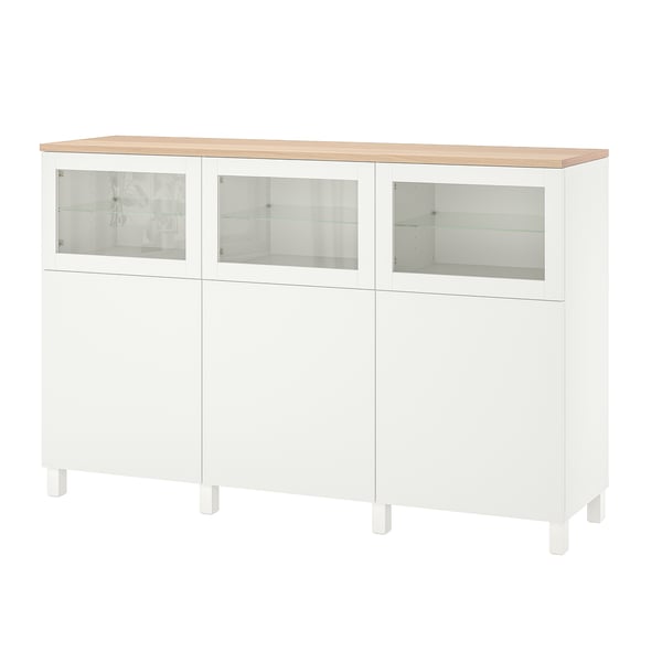 White BESTÅ cabinet: modern, wooden top, glass doors, adjustable shelves, four legs.