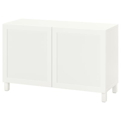 A white ikea BESTÅ sideboard, rectangular, with two doors, and four legs.