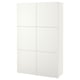 A white BESTÅ storage unit. Its rectangular with multiple compartments, featuring clean lines and a minimalist design.