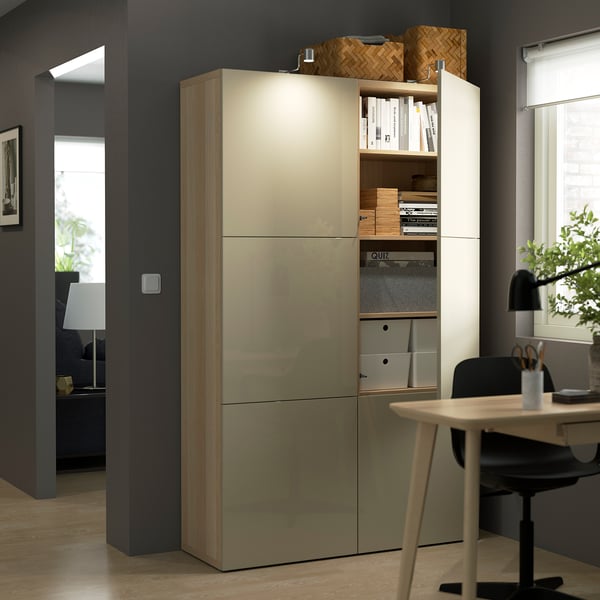 Modern office with BESTÅ storage unit; adjustable shelves, push-open doors, neat workspace.