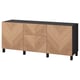 Modern wooden cabinet, light wood, black top, three doors, rectangular shape, herringbone pattern.