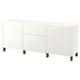 A white BESTÅ sideboard with four legs. It has two doors and a sleek, modern design for storage.