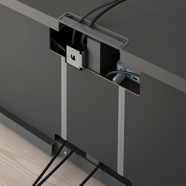 Cable management system of BESTÅ tv bench, shows neat cable routing and adjustable leg.