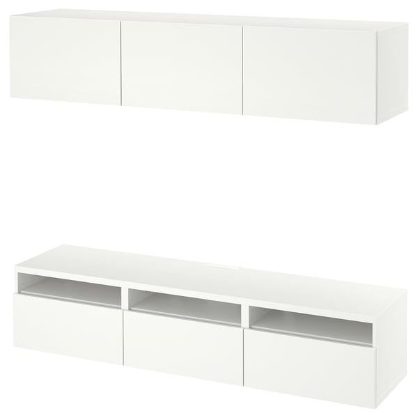 Two white BESTÅ tv units: bottom has shelves and drawers, top has closed cabinets. Modern and clean design.
