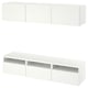 Two white BESTÅ units: one with closed cabinets, one with open shelves for storage and cable management.