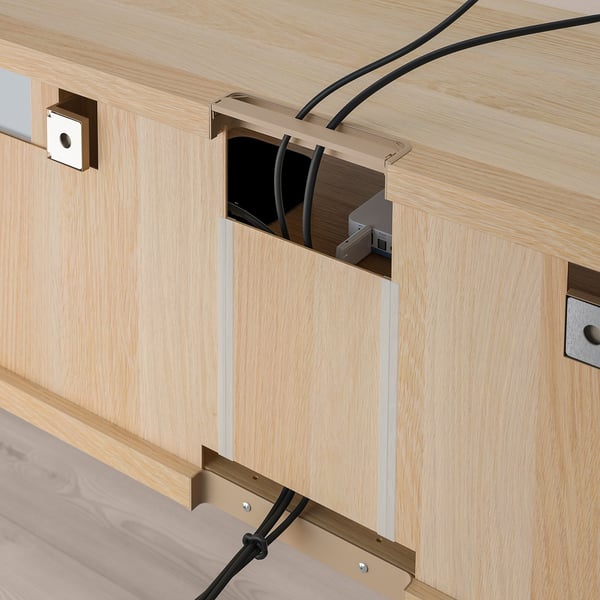 Wooden tv bench with cable management system. Drawers open with push mechanism, cables hidden behind slots.