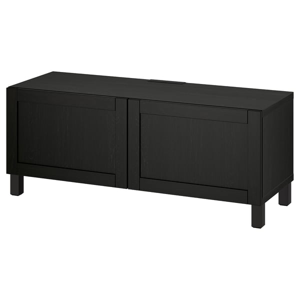 Black ikea BESTÅ minimalist storage tv bench, rectangular with 2 cabinet doors.