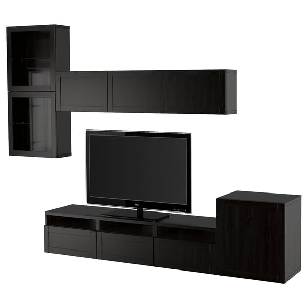Black BESTÅ tv stand with shelves and cabinets. Modern, sleek design, ideal for living rooms.