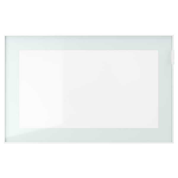 Minimalist BESTÅ storage unit. White, rectangular, with frosted glass door. Modern, streamlined look.