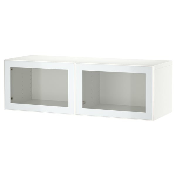 A white BESTÅ storage unit with glass doors, rectangular, modern design.