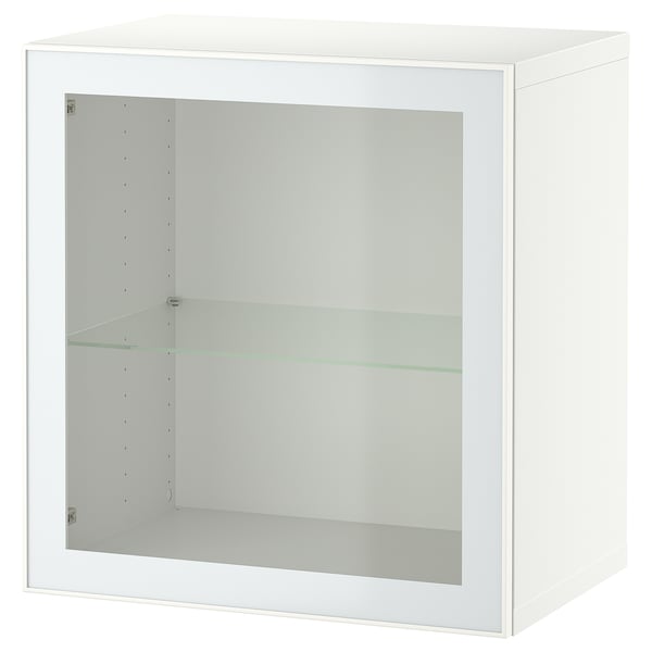 A white BESTÅ cabinet with clear glass door displaying storage space inside.