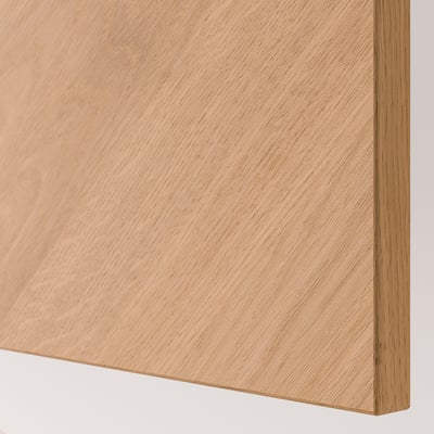 Close-up of a smooth, light wooden panel, showcasing its fine grain texture and polished finish.