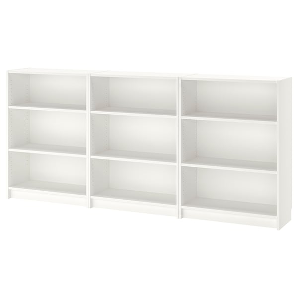 A white BILLY bookshelf with multiple adjustable shelves.