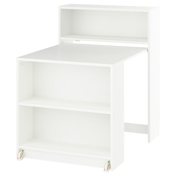 White BILLY bookcase with pull-out table, compact for small spaces.