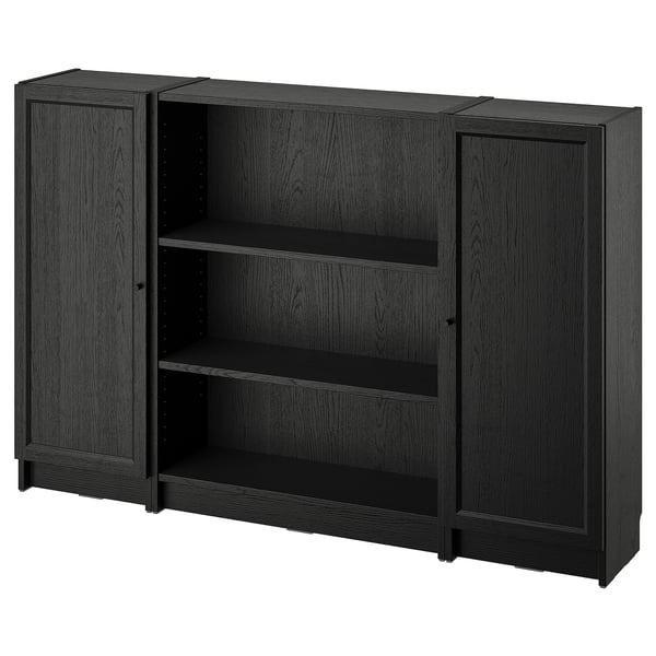 Dark brown BILLY bookcase with closed and open sections, modern design.