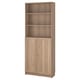 BILLY bookcase: tall, light brown, wooden, rectangular with open and closed storage.