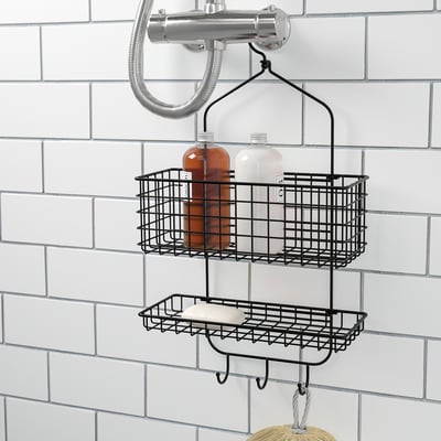Black wire shower caddy with two tiers holds bottles and soap, hooks below for towels, mounting hardware included.