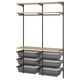 A BOAXEL storage system in black, featuring shelves and mesh baskets for organizing items.