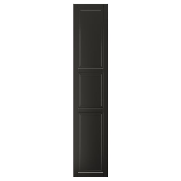 A black BODBYN closet door with a classic bevelled panel design, made from fiberboard for durability.