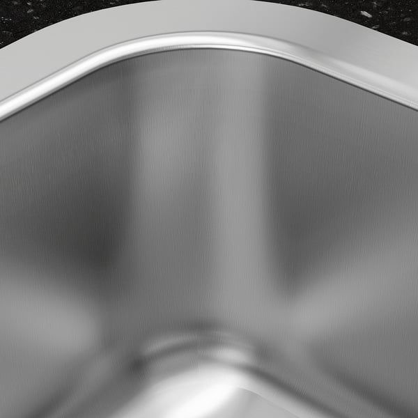 Modern stainless steel sink, gleaming surface, smooth design, ideal for durable and hygienic kitchen use.