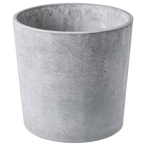 Cylindrical grey concrete planter with natural speckles, soft feet, for indoor/outdoor use.