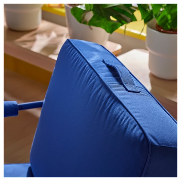 Modern blue gaming chair with foldable seat cushion, sturdy construction, and premium materials.