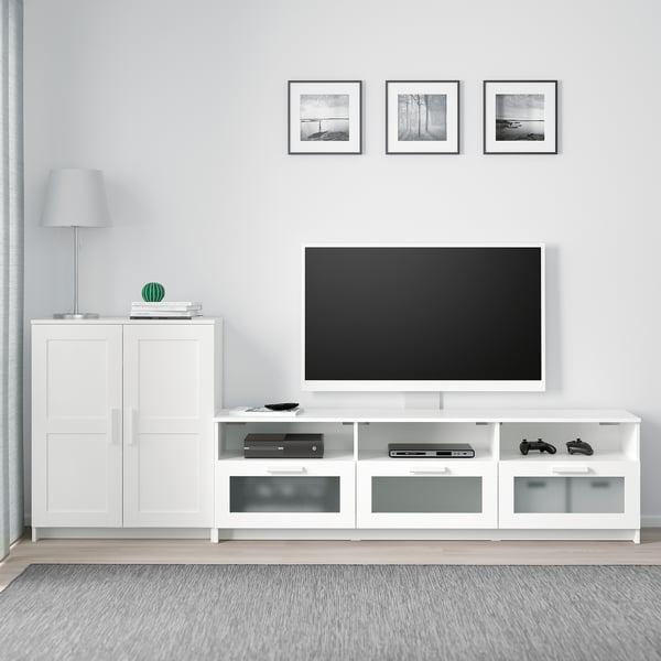 BRIMNES tv unit & cabinet in white, sleek design, adjustable shelves, glass doors, organised storage, mounted tv.
