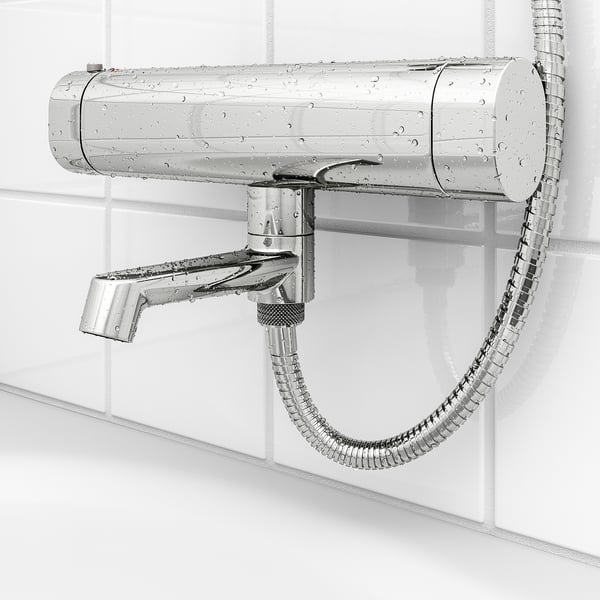 Shower setup with temperature safety stop, chrome finish, wall-mounted, flexible hose.
