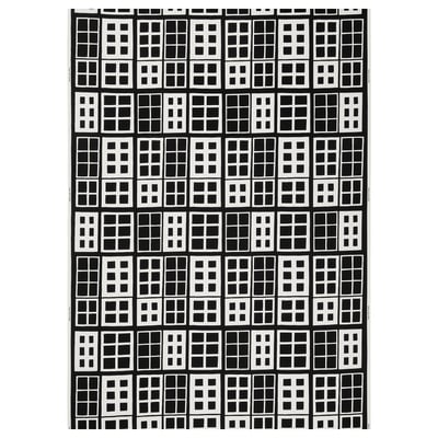 Black and white grid pattern fabric, rectangular shape, window pane design.